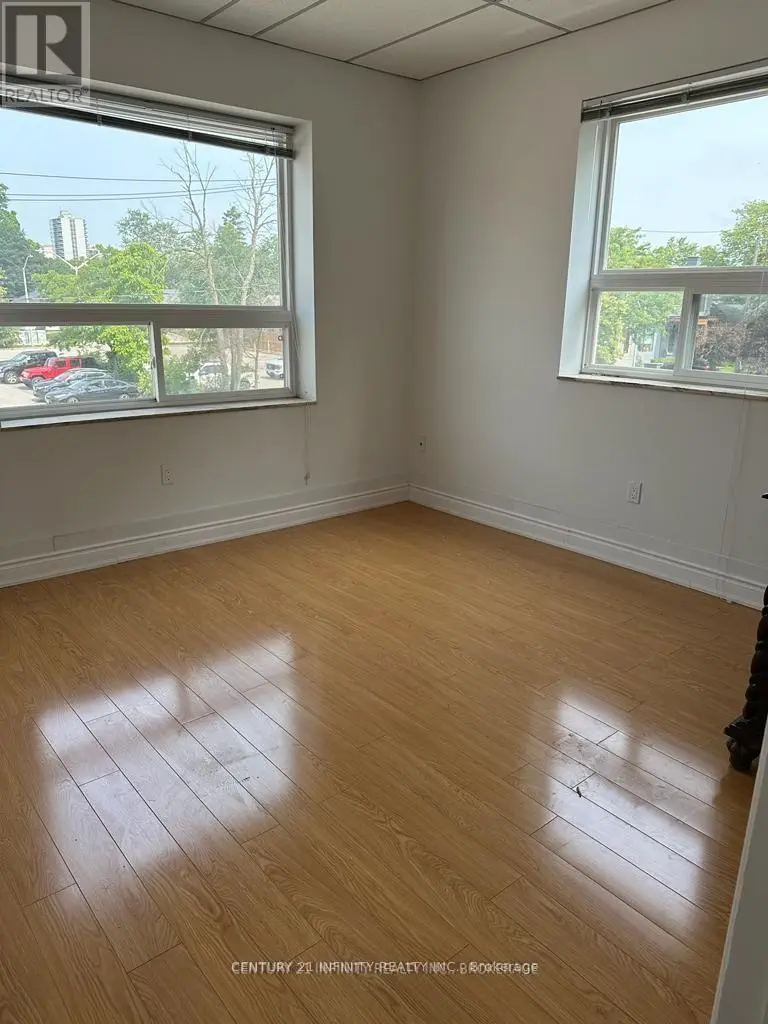207 - 323 Kerr Street, Oakville, Ontario  L6K 3B6 - Photo 1 - W12051180