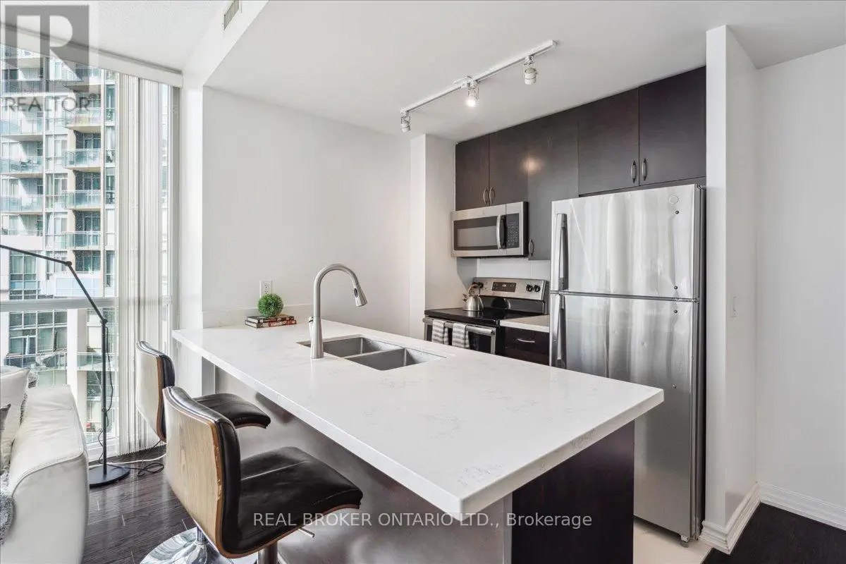 1111 - 223 Webb Drive, Mississauga, Ontario  L5B 0E8 - Photo 3 - W12037364