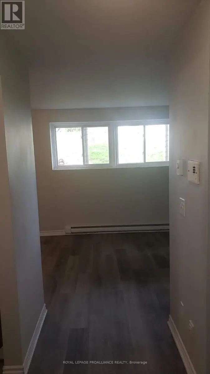 112 - 260 Academy Street, Loyalist, Ontario  K0H 1G0 - Photo 3 - X12128139