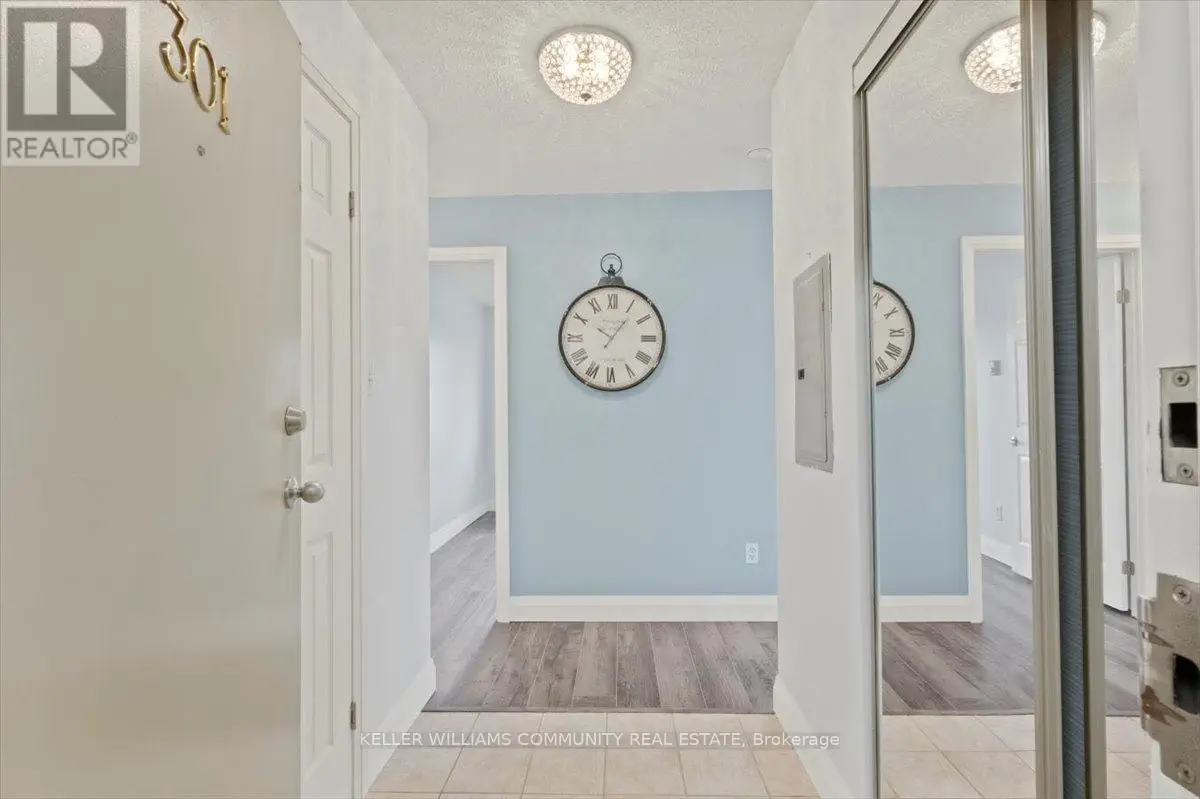 301 - 91 Aspen Springs Drive, Clarington, Ontario  L1C 5J9 - Photo 3 - E12138578