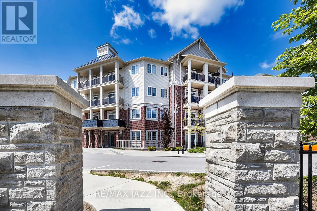 203 - 80 Aspen Springs Drive, Clarington, Ontario  L1C 0V4 - Photo 1 - E12145445