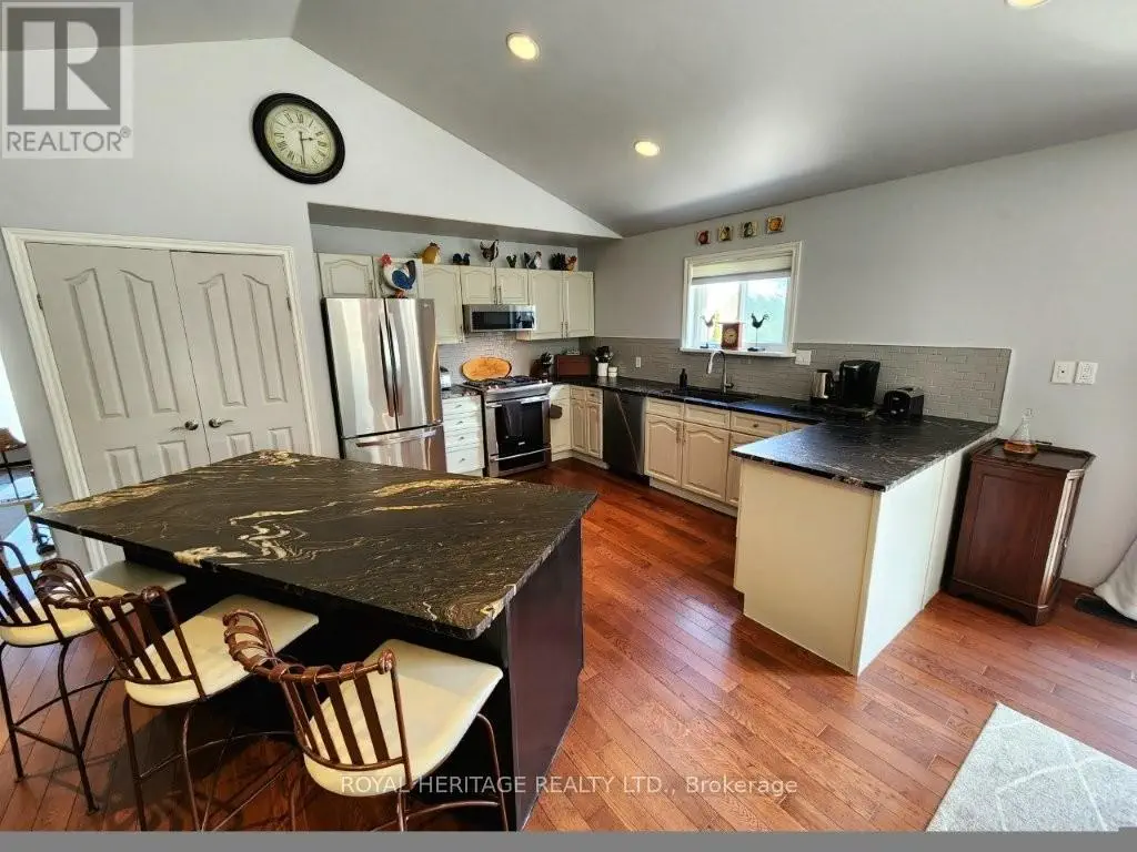 8188 Woodland Avenue, Port Hope, Ontario  L0A 1B0 - Photo 3 - X12121321