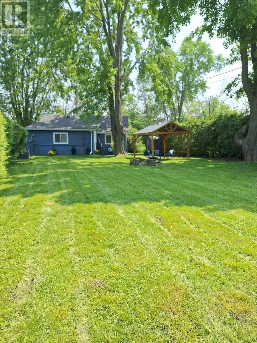 77 Blue Heron Drive, Georgina, Ontario  L0E 1N0 - Photo 1 - N12226171