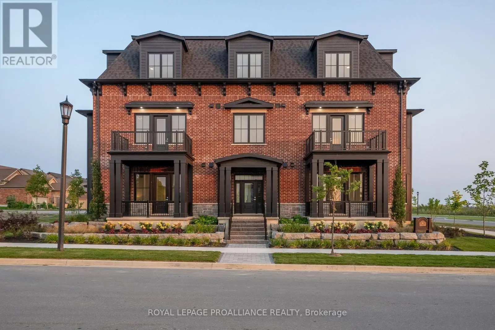202 - 941 Charles Wilson Parkway, Cobourg, Ontario  K9A 0L2 - Photo 1 - X12227138