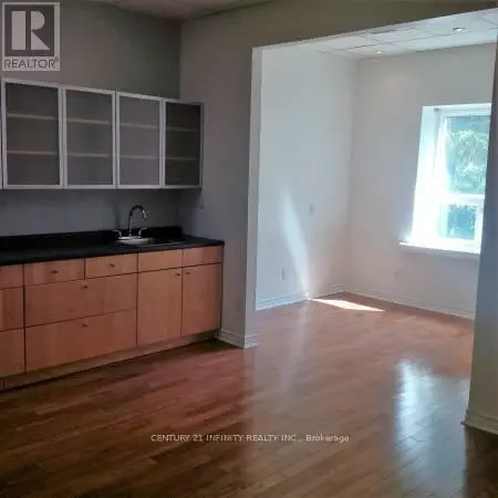 200 - 323 Kerr Street, Oakville, Ontario  L6K 3B6 - Photo 1 - W12227430