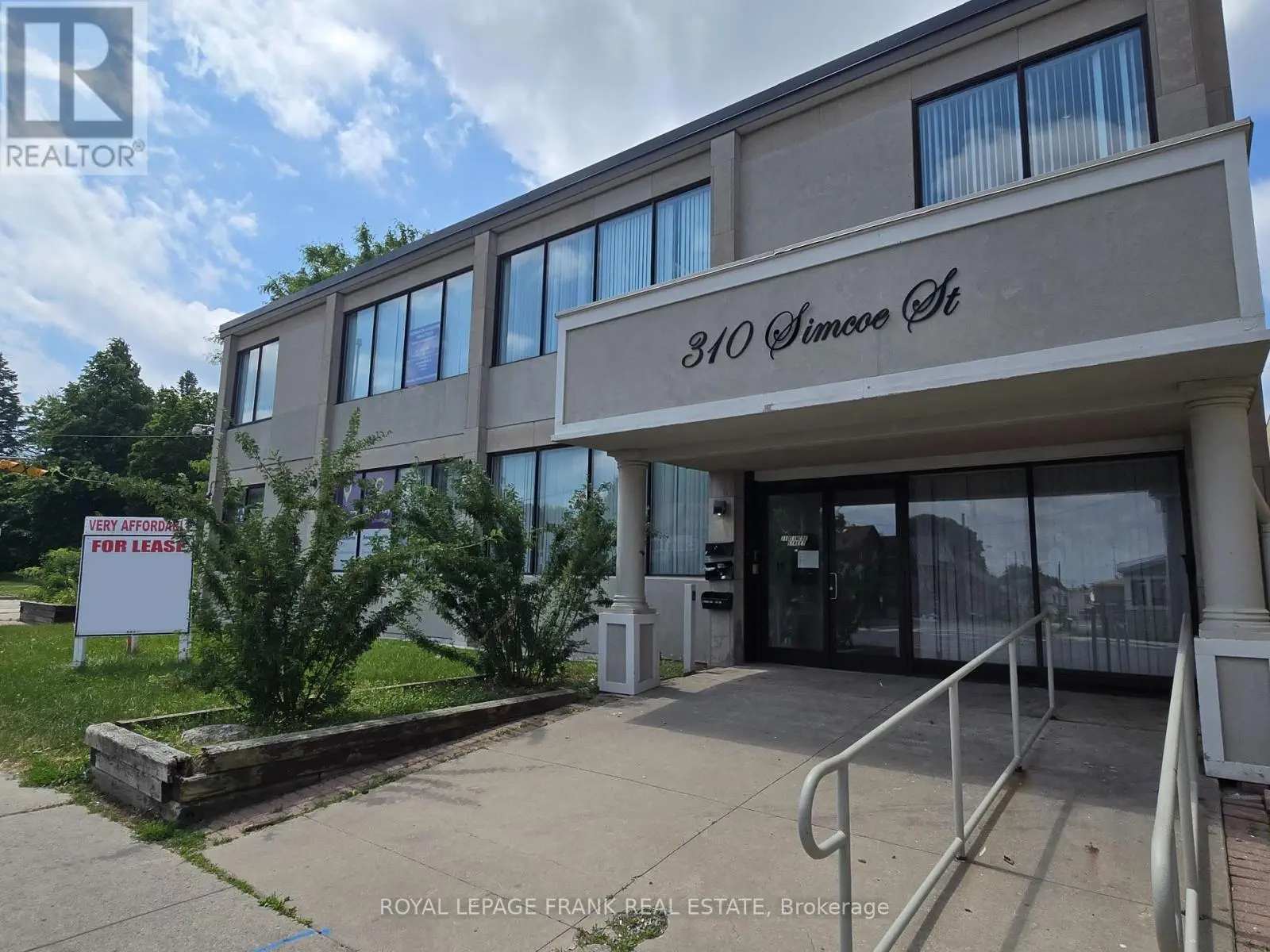 205 - 310 Simcoe Street S, Oshawa, Ontario  L1H 4H7 - Photo 1 - E12247853