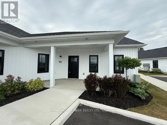 201 - 14 Meadowcreek Drive, Brighton, Ontario  K0K 1H0 - Photo 2 - X12247997