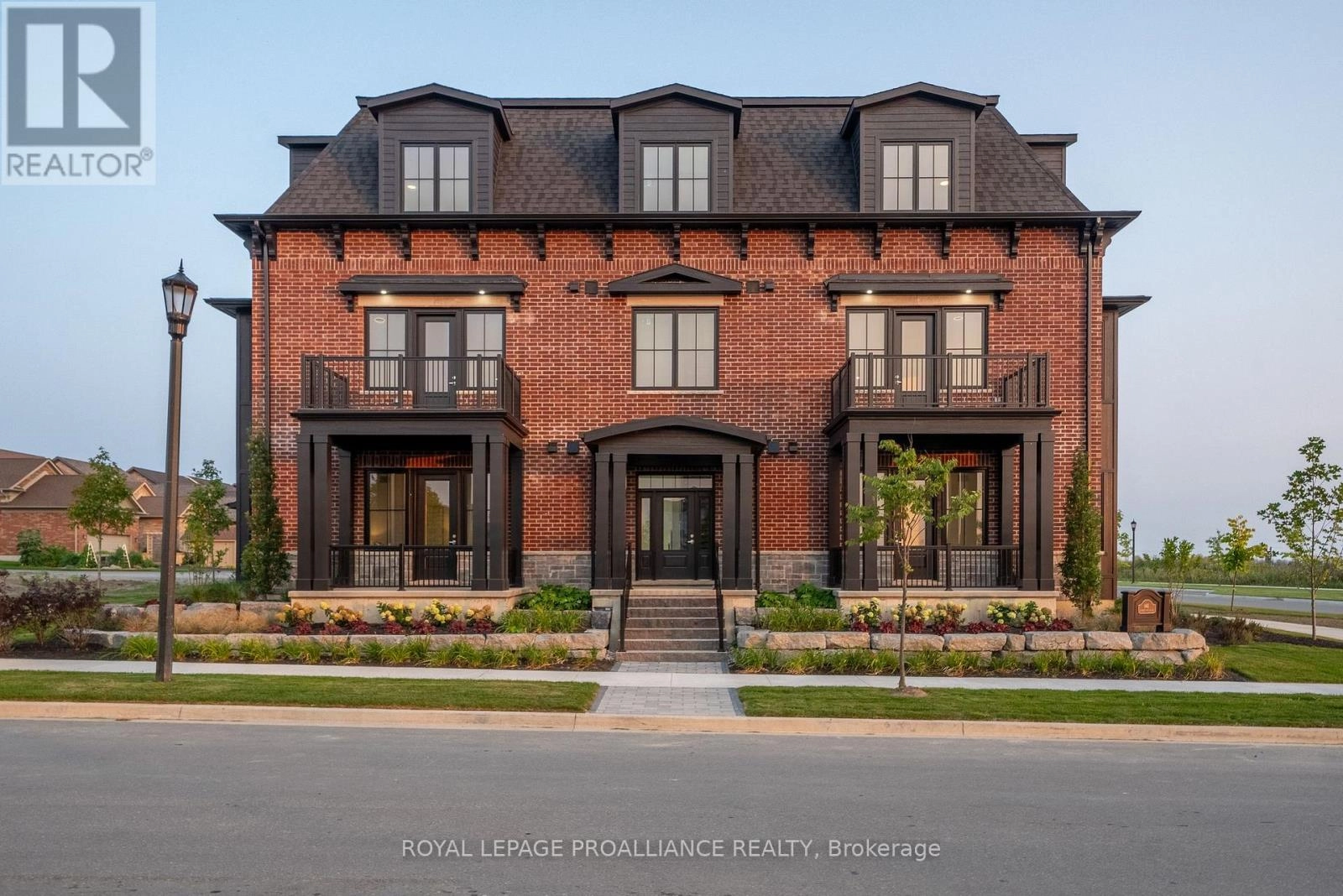 202 - 941 Charles Wilson Parkway, Cobourg, Ontario  K9A 0L2 - Photo 1 - X12227138