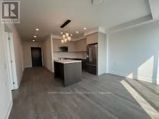 409 - 195 Hunter Street, Peterborough Central, Ontario  K9H 0K6 - Photo 1 - X12255634
