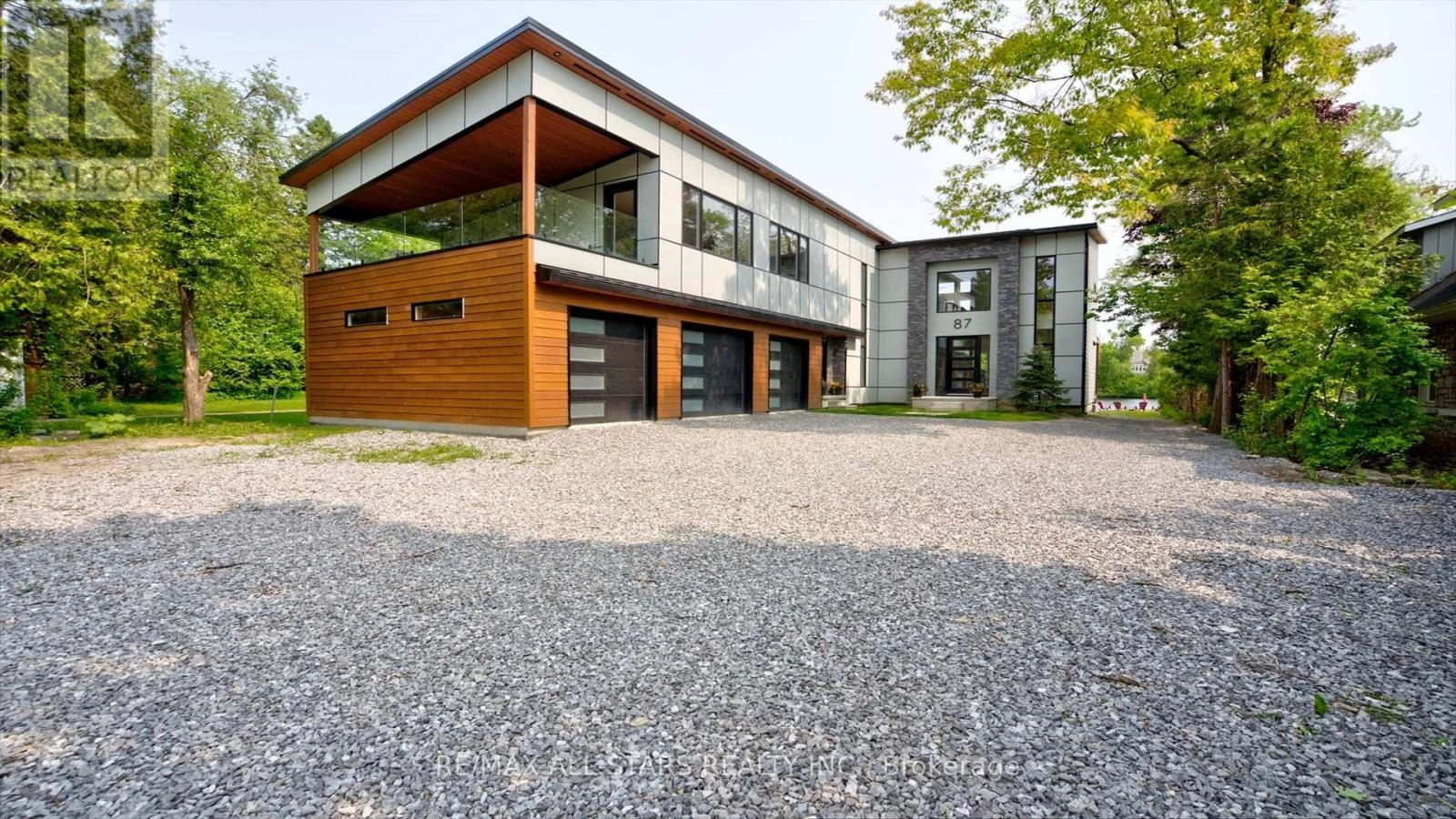 87 Riverside Drive, Kawartha Lakes, Ontario  K0M 1A0 - Photo 1 - X12255806