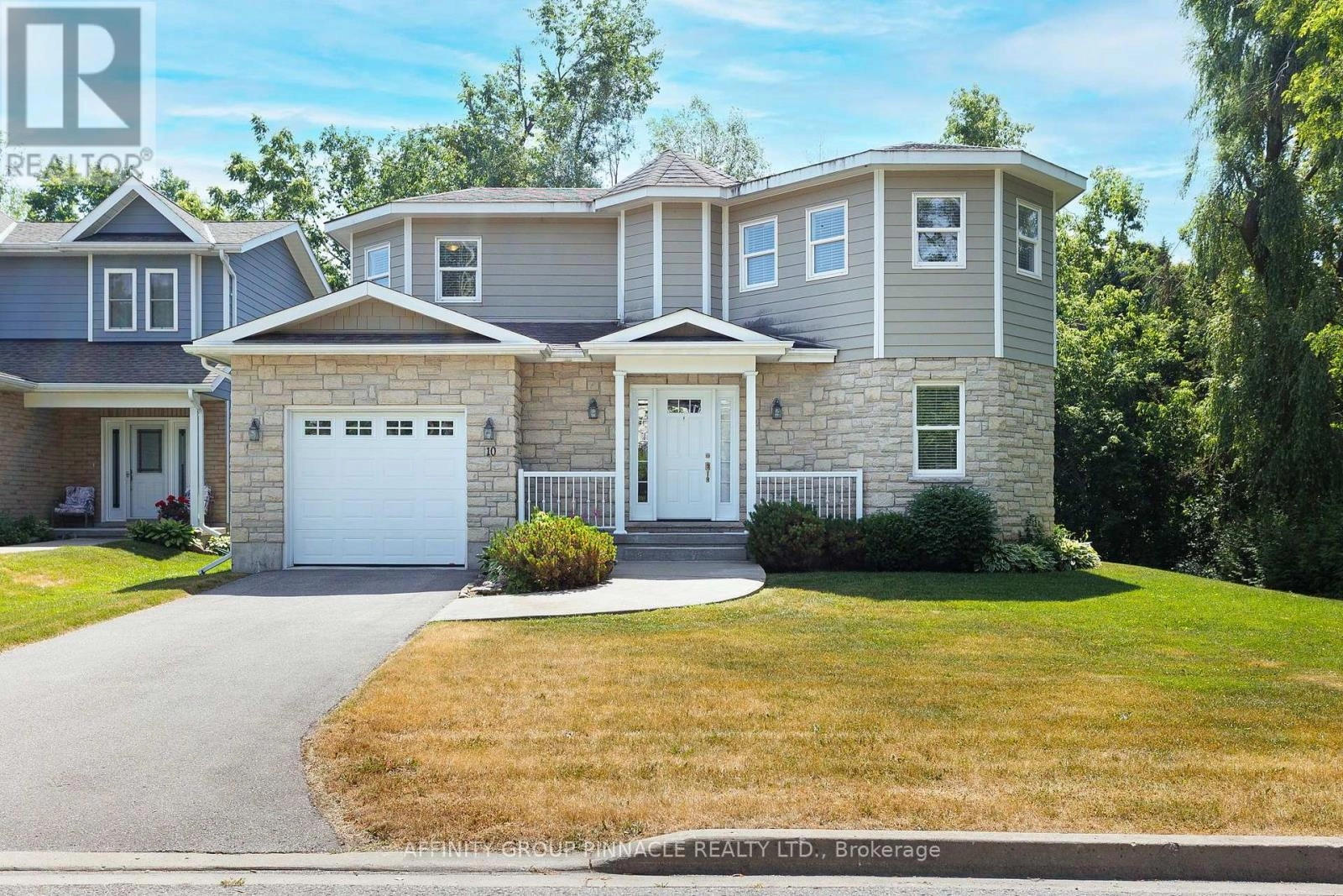 10 Deane Street, Kawartha Lakes, Ontario  K0M 1N0 - Photo 1 - X12275633