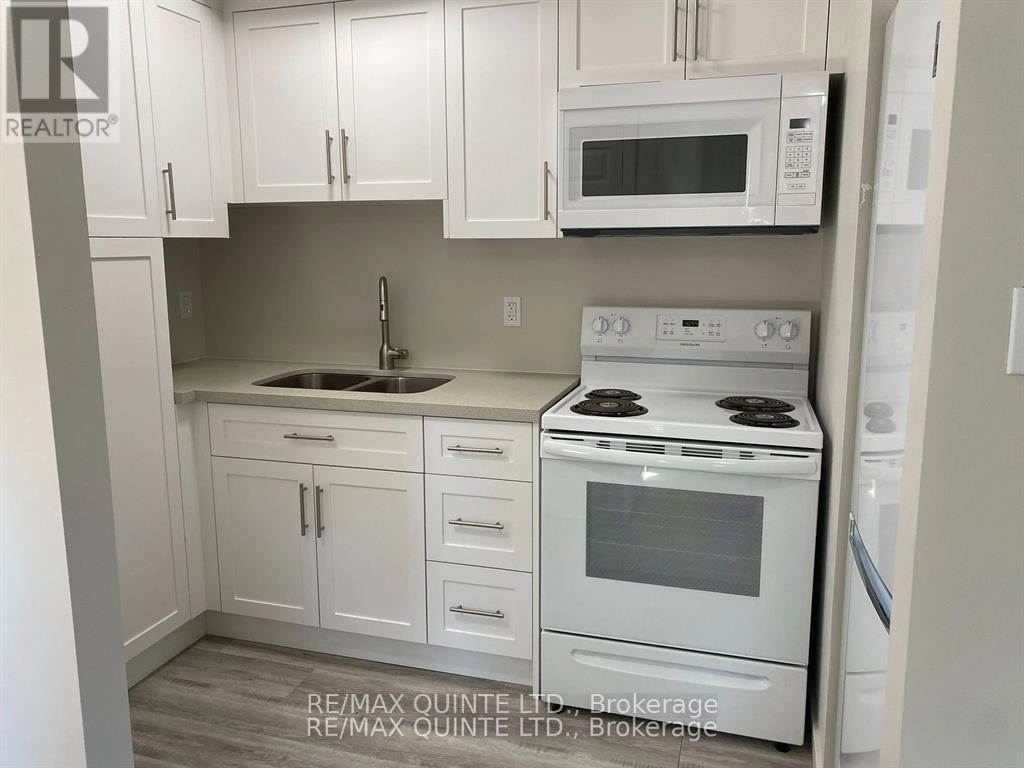 6 - 2 Village Drive, Belleville, Ontario  K8P 4J8 - Photo 2 - X12298341