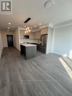 409 - 195 Hunter Street, Peterborough Central, Ontario  K9H 0K6 - Photo 2 - X12341574