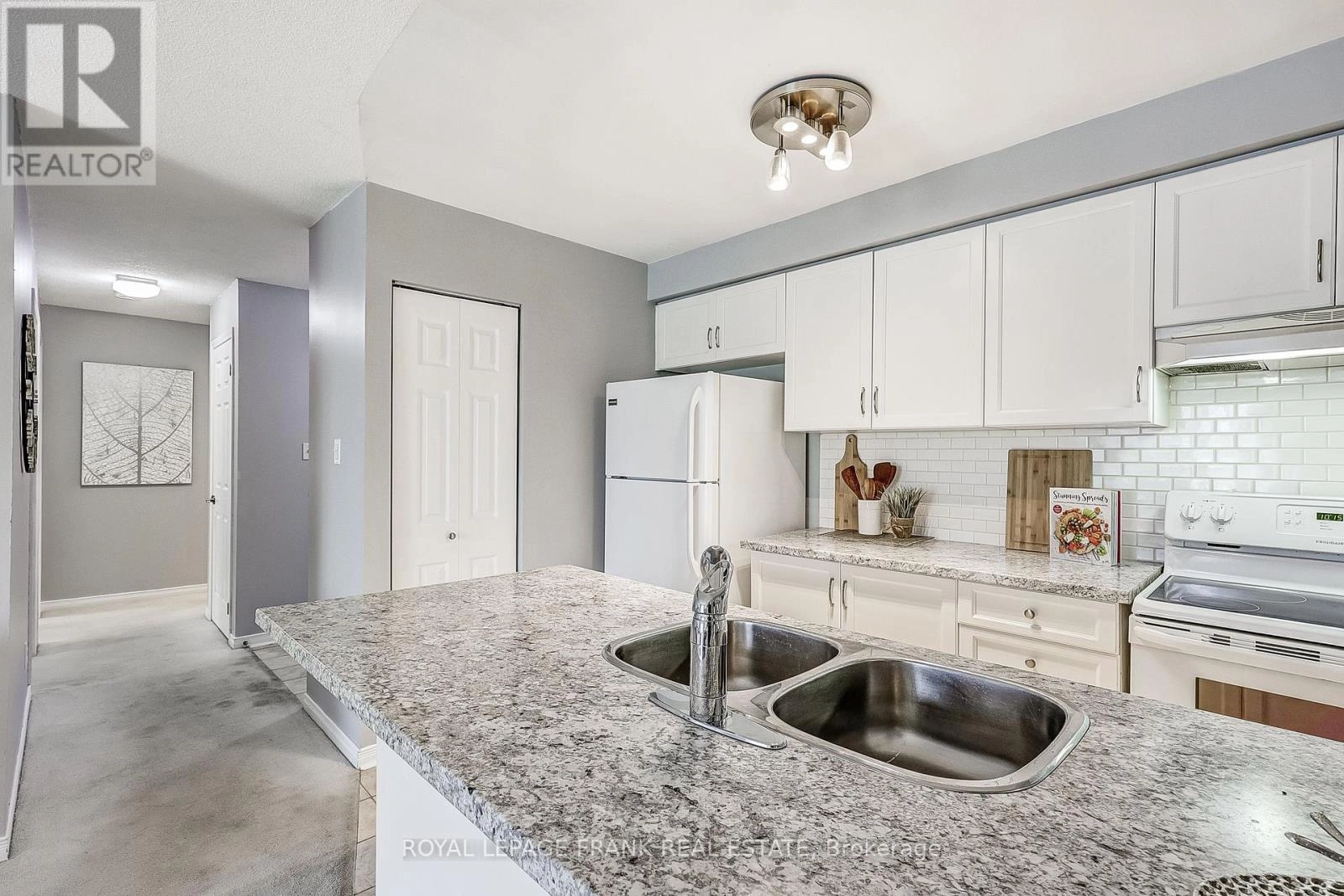 311 - 94 Aspen Springs Drive, Clarington, Ontario  L1C 5A2 - Photo 3 - E12350246