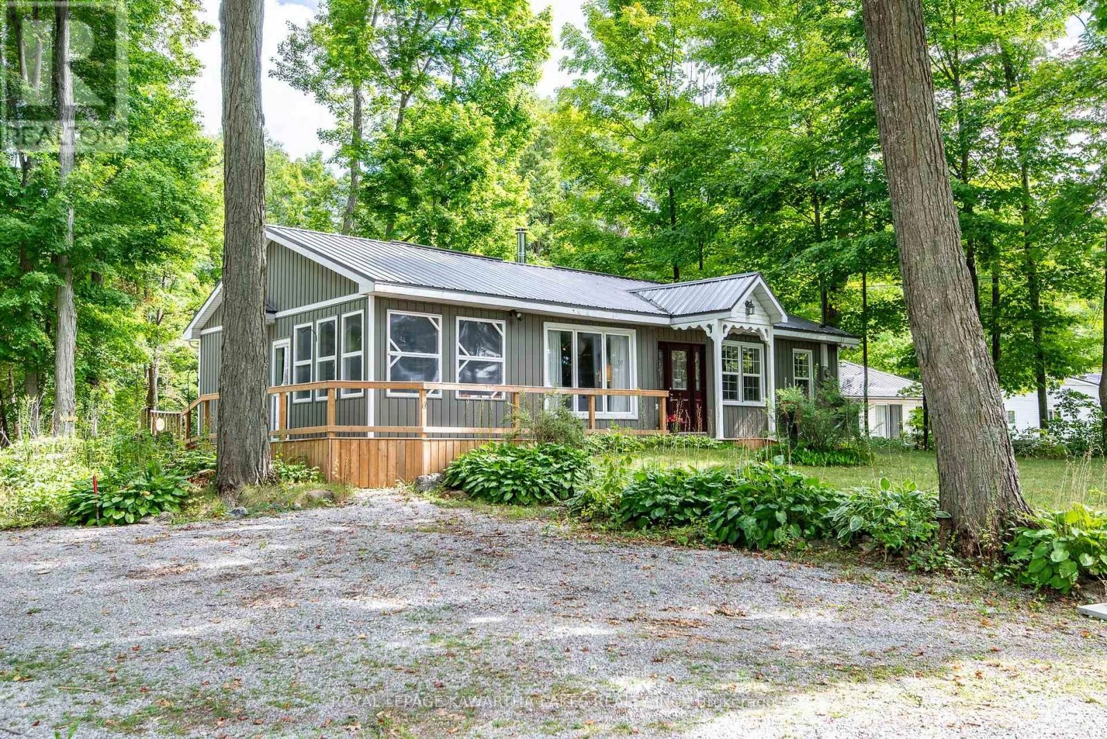 130 Driftwood Village Drive, Kawartha Lakes, Ontario  K0M 1K0 - Photo 1 - X12363936