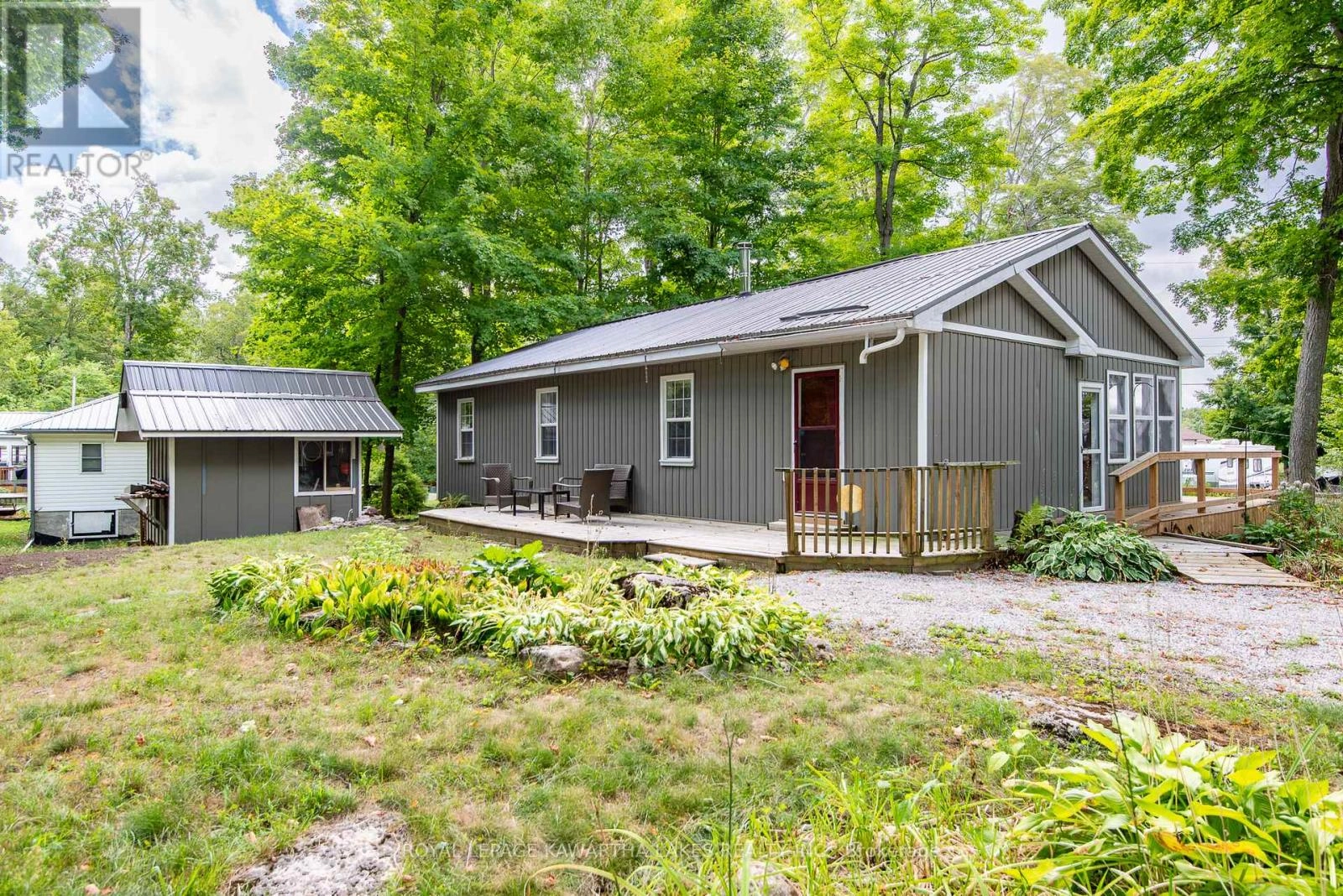 130 Driftwood Village Drive, Kawartha Lakes, Ontario  K0M 1K0 - Photo 2 - X12363936